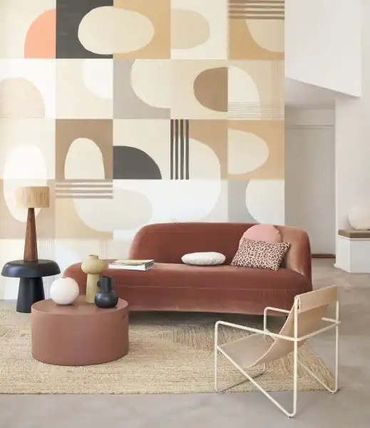 mural panoramic for living room geometric pattern in plain neutral colors. Wallpaper installed in living room for a room shot highlighting beige tan sand toned colors. 